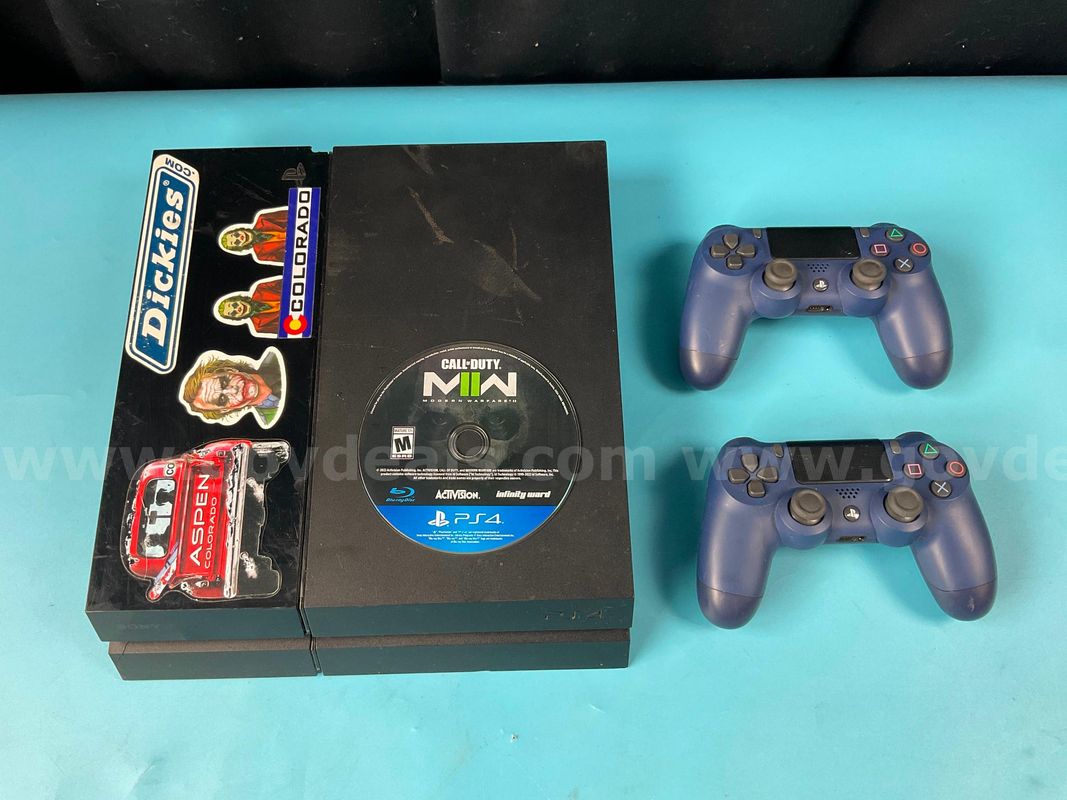 Sony PlayStation 4 with 2 - Controllers and 1 - Game Disc, All Power On (Cables Not Included)