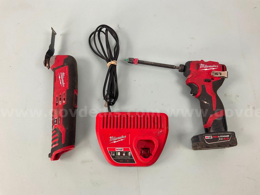 2 - Milwaukee Cordless Power Tools with Battery and Charger, All Power On