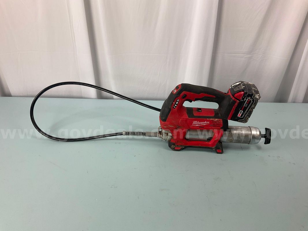 Milwaukee Cordless Grease Gun Model 2646-20 with 3ah Battery, Powers On (Battery Damaged)
