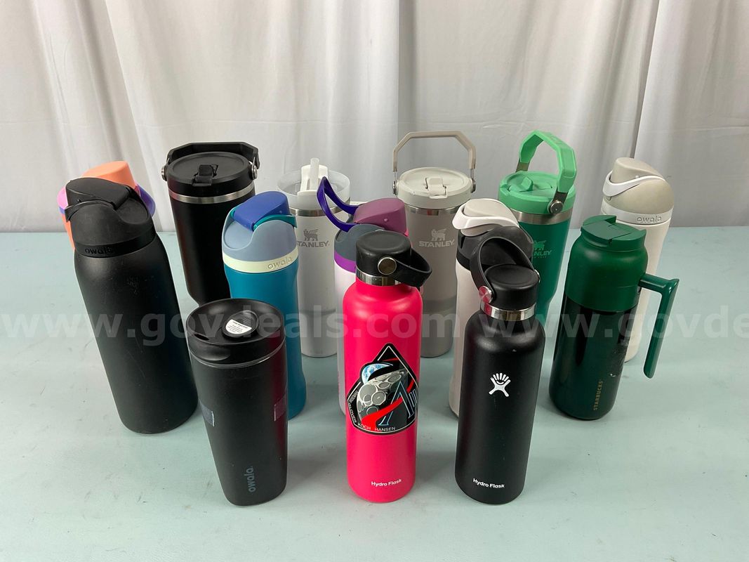 14 - Water Bottles: 7 - Owala, 4 - Stanley, 2 - Hydroflask & 1 - Starbucks