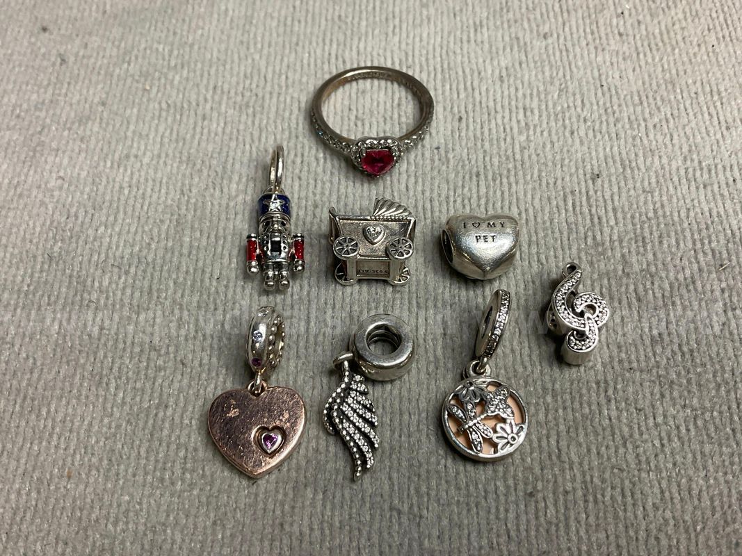8 - Pieces of Silver Jewelry Labeled as Pandora