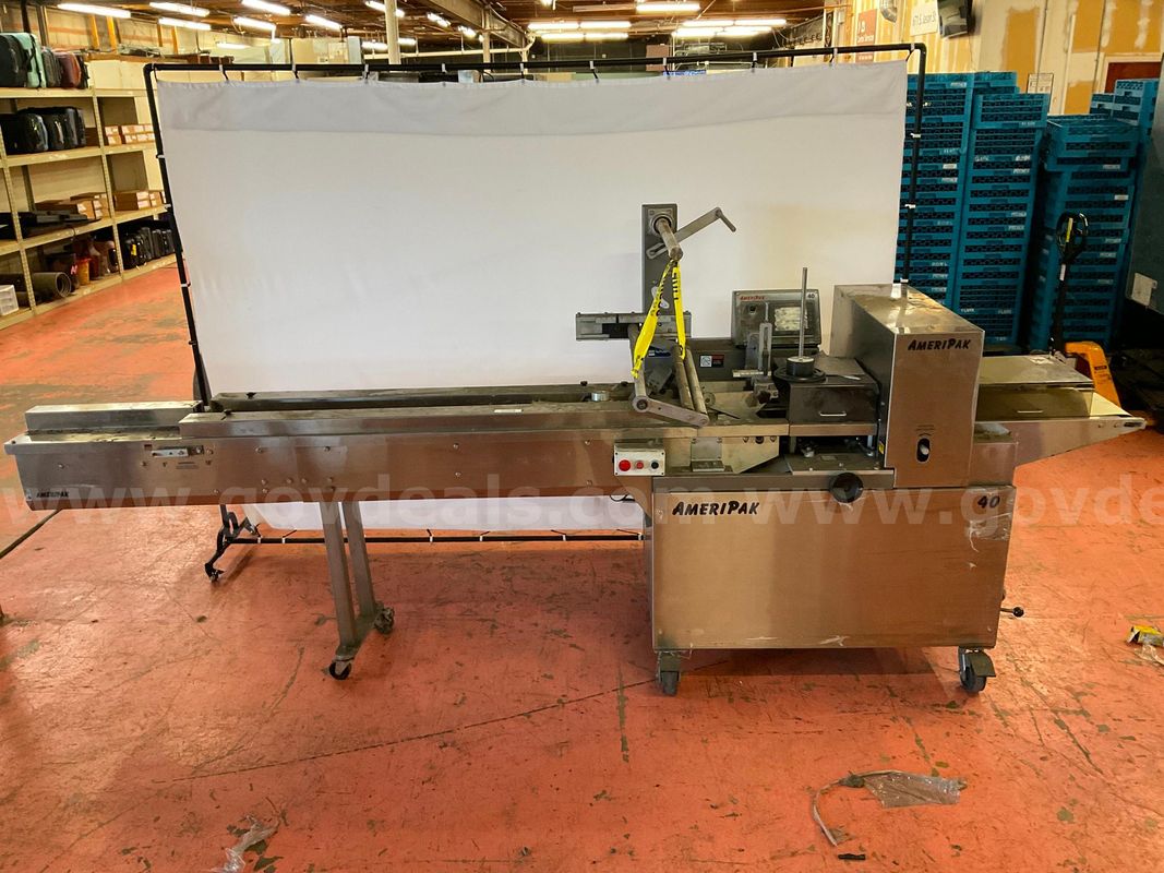 Ameripak 40 Horizontal Flow Wrapper Packing Machine With Conveyor Belt