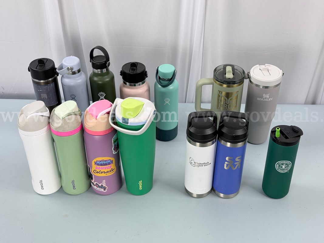 14 - Water Bottles: 5 - Hydro Flask, 4 - Owala, 2 - Stanley, 2 - Yeti, and 1 - Starbucks