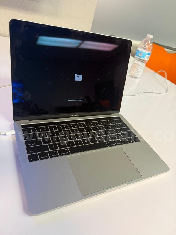 Approximately 7 MacBook Model A1989 and 1 Model A1932