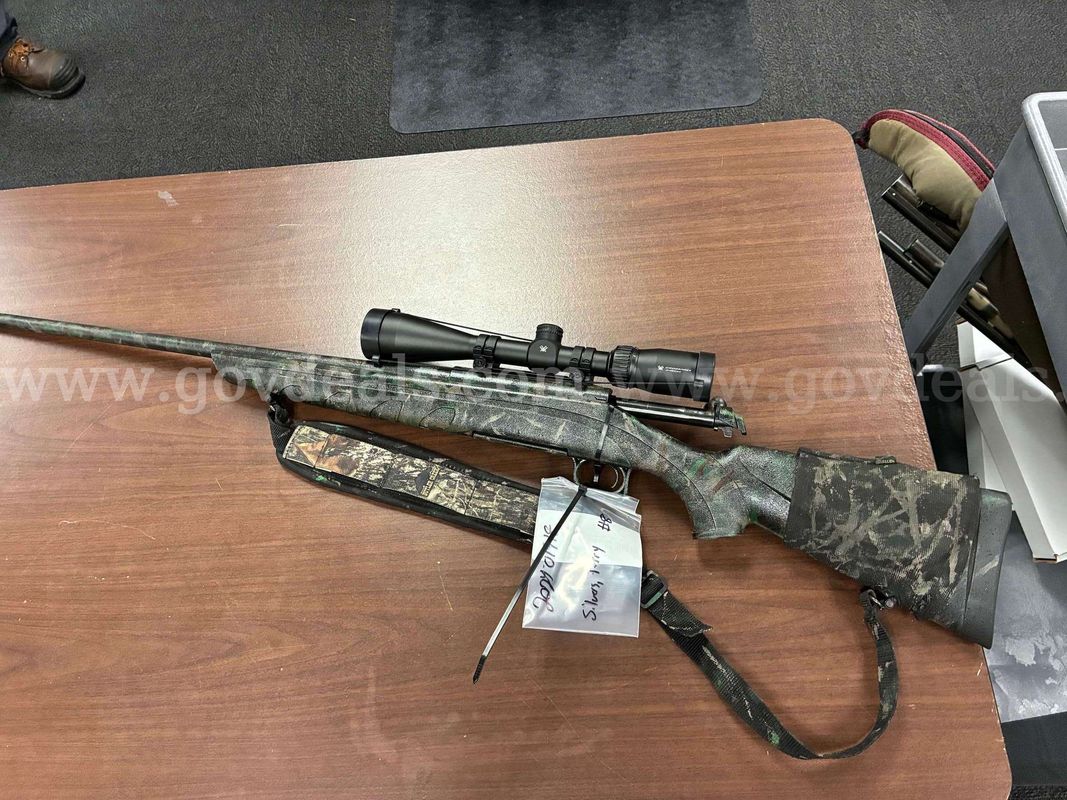 Remington 7mm Rifle with scope