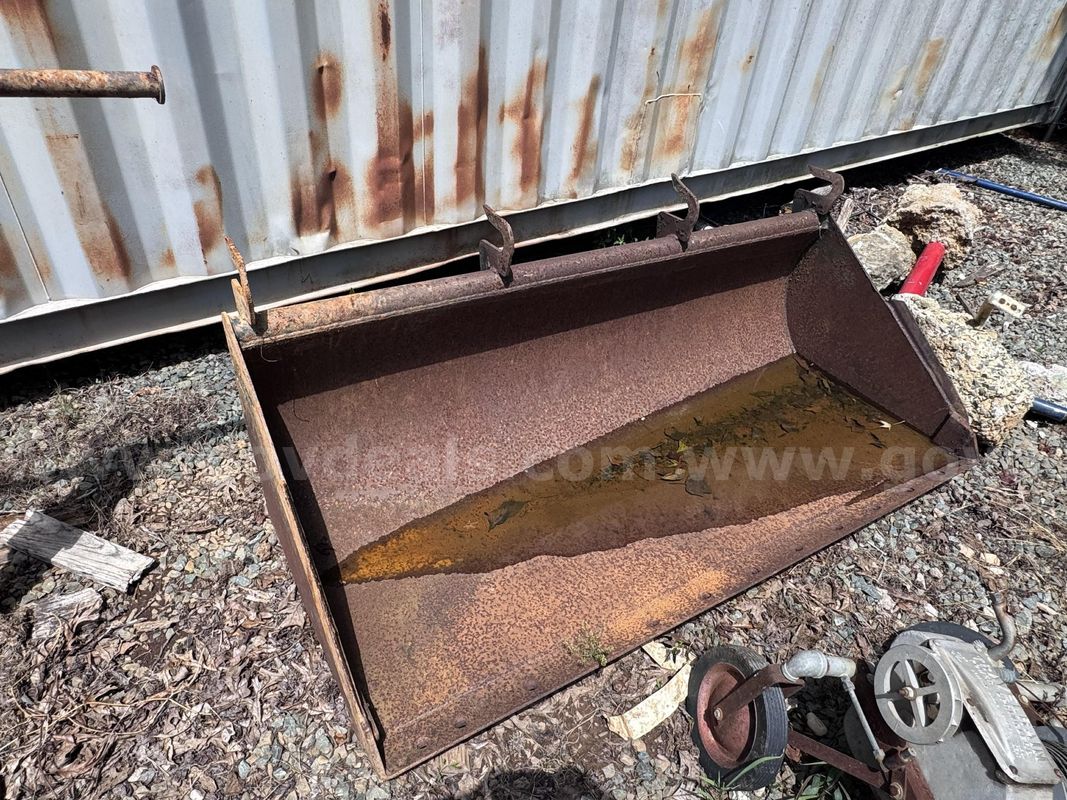 W.R. Long Inc. Bucket Attachment for a Ford 7410 Tractor