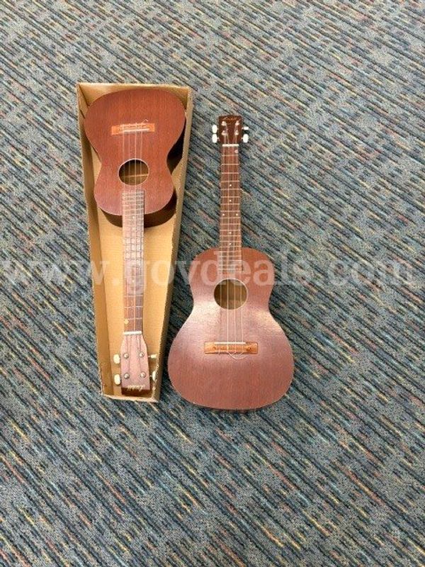 2 Lindell bass ukuleles