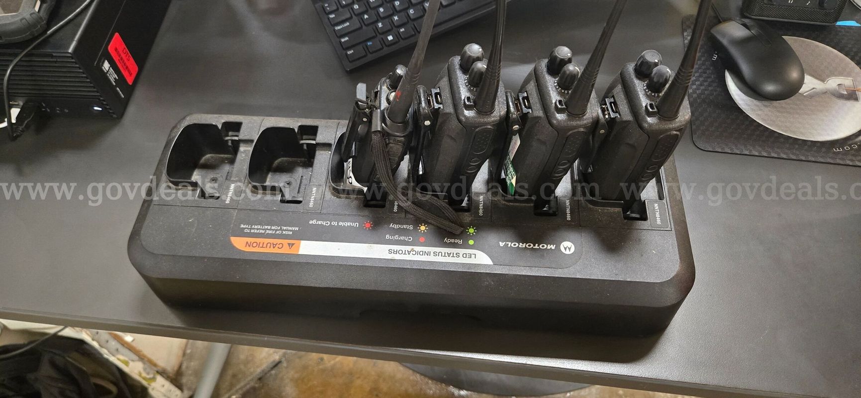 Lot of 4 Assorted Walkie-Talkies and a Motorola charging base