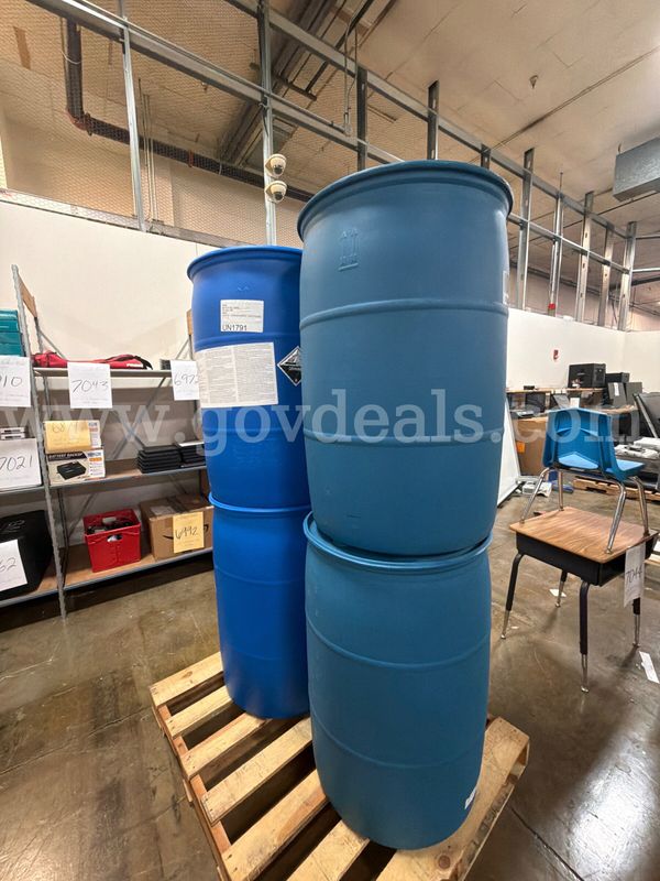 Lot of Four 55 Gallon Plastic Barrels