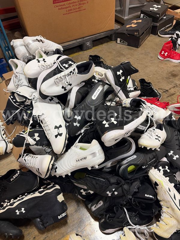 Lot of 66 Assorted UnderArmour Football Cleats & Basketball Shoes
