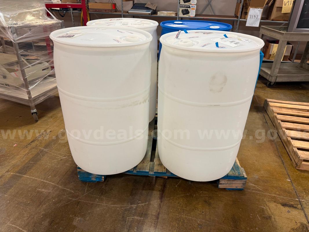 Lot of Four 55 Gallon Plastic Barrels