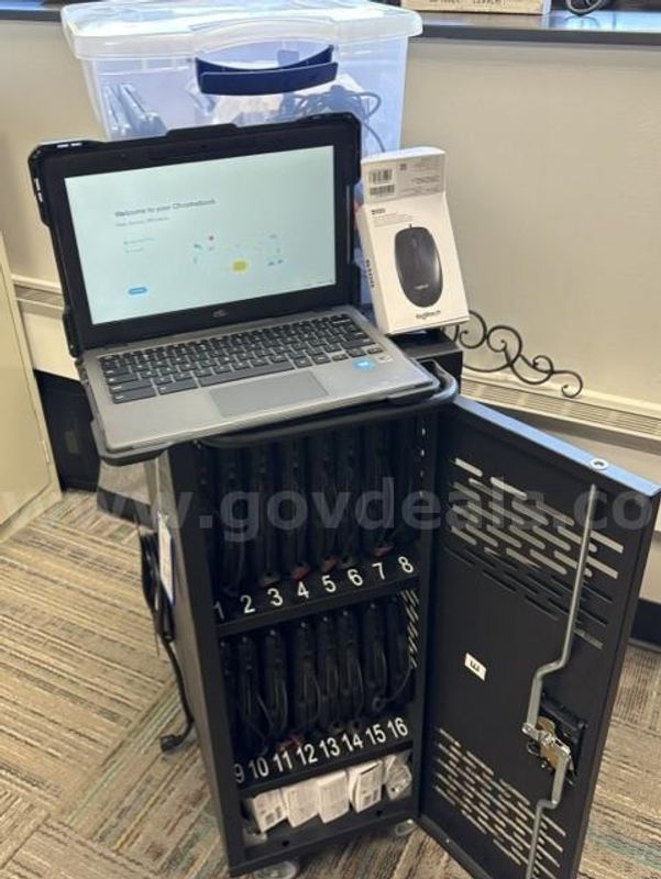 LOT OF CHROMEBOOKS WITH CHARGING TOWER