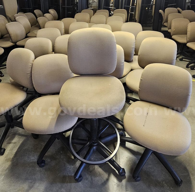 Approx. 26 Tan Rolling Office Chairs