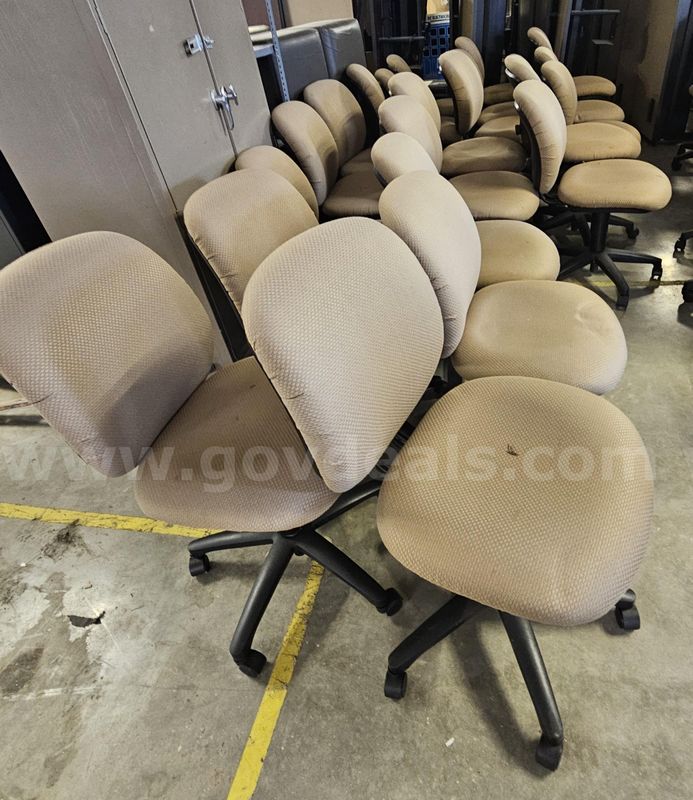 Approx. 21 Tan Rolling Office Chairs