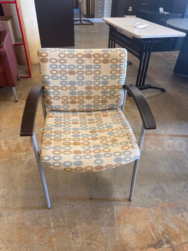 Tan Cushioned Chair