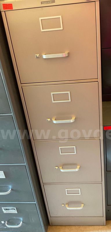 Tan 4 drawer steelcase filing cabinet