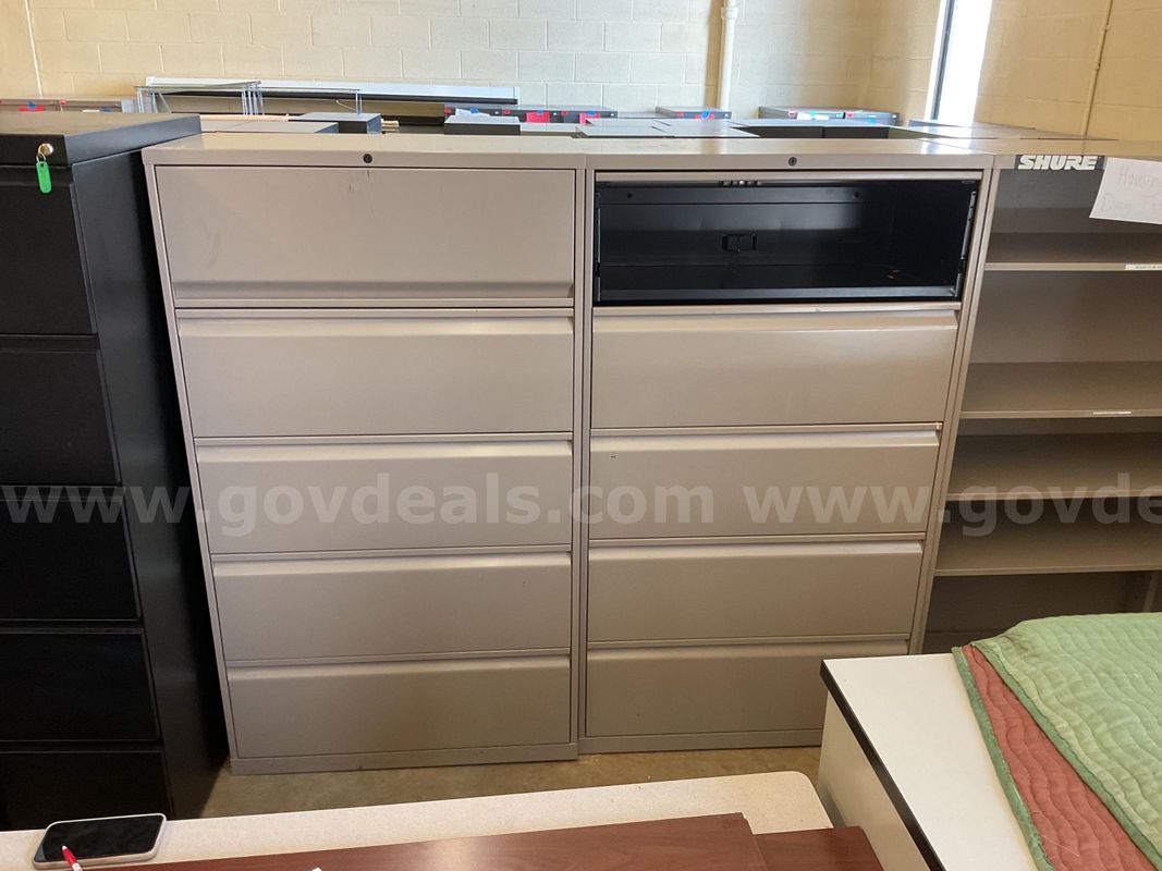 Lot of 2 tan 5 drawer cabinets