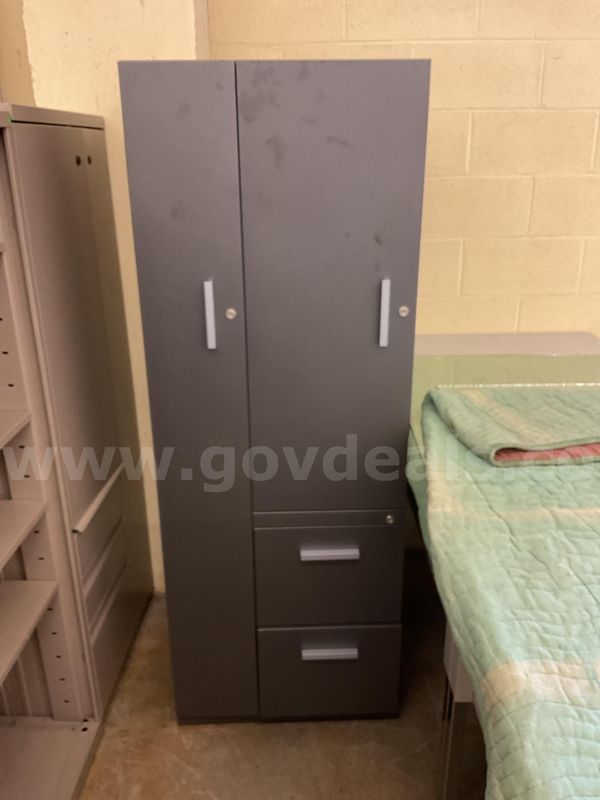 A dark grey 2 door 2 drawer cabinet