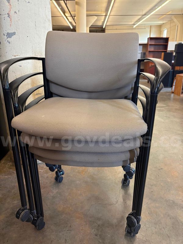 Lot of 4 fabric rolling chairs