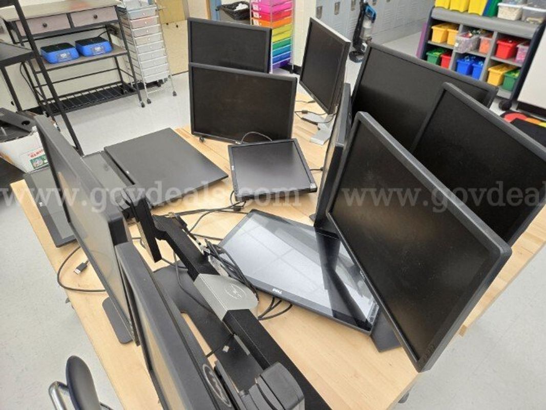 An assortment of used Dell monitors