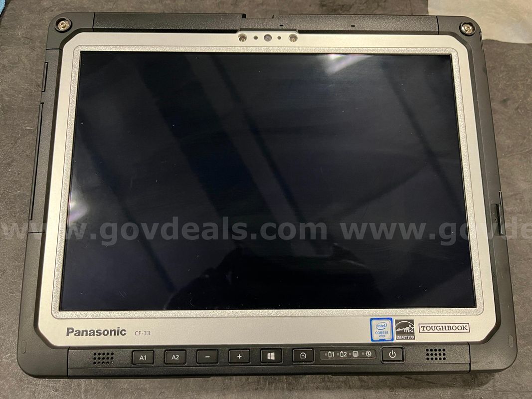 Lot of 6 Panasonic Toughbook CF-33 touchscreen PC's with new in box docks, used keyboards, and used power supplies
