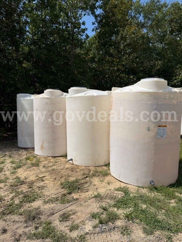 1 Plastic storage tank that was used to hold bleach and caustic chemicals - unsure if they leak