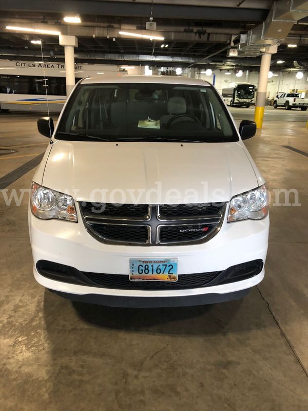 2019 Dodge Entervan, Wheelchair accessible with a manual pull out ramp. In Fair condition.