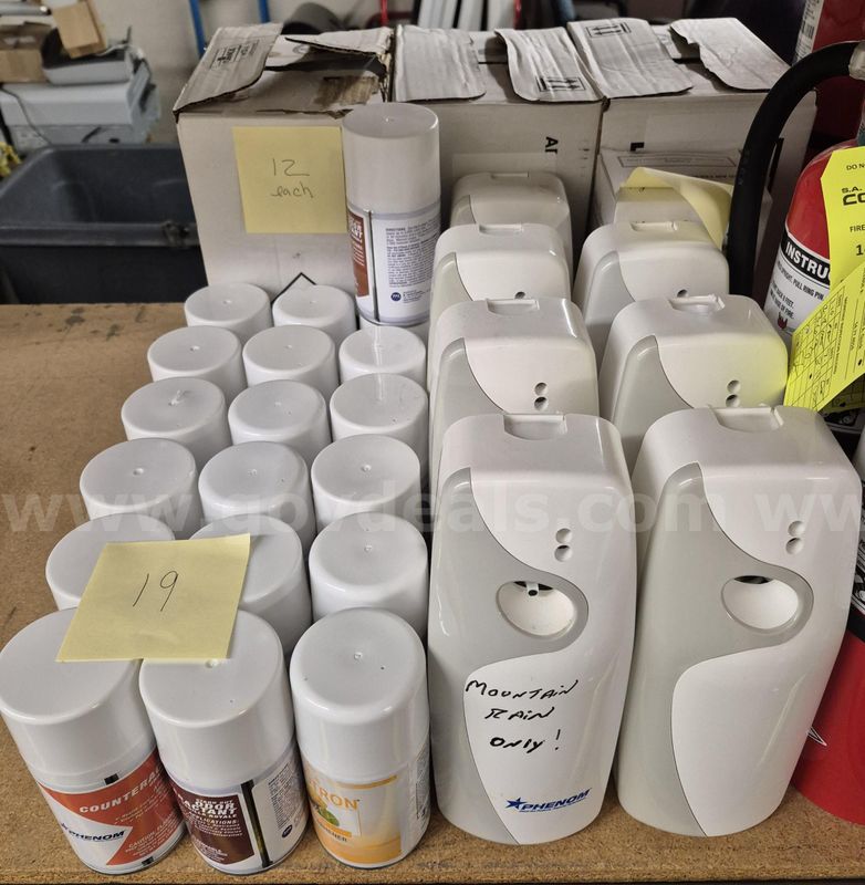8 Automatic Dispensers, 3 Boxes of 12, and 19 unboxed Air Freshener Spray Refills