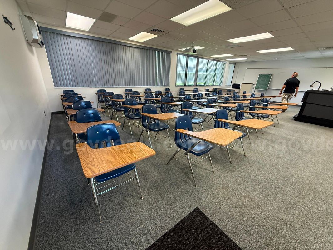 Lot of Approximately 43 Classroom Combination Desk Chairs