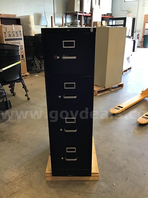 1 narrow, black metal, 4 drawer filing cabinet