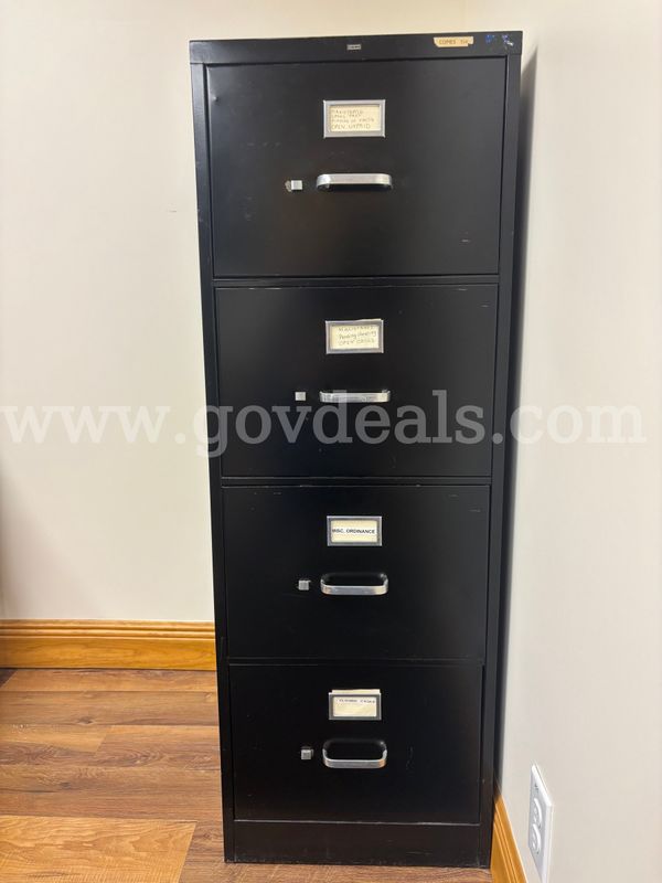 Three 4-drawer filing cabinets, 2 tan, 1 black