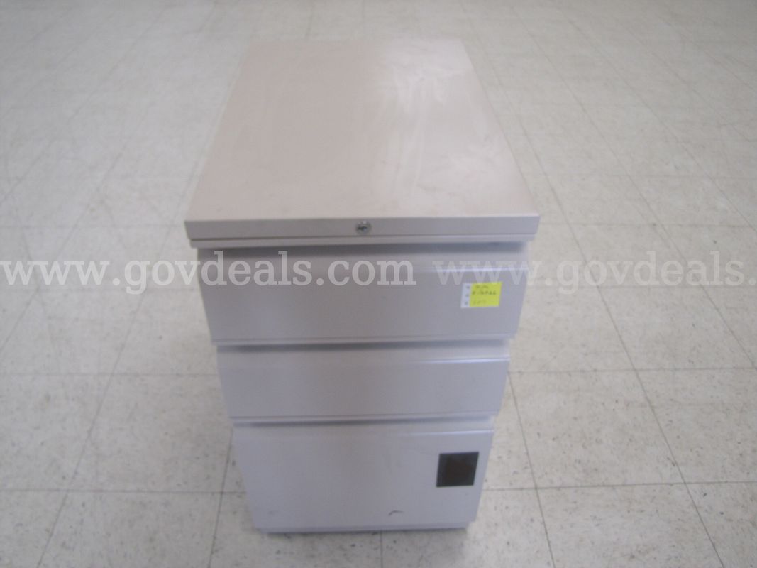 Rolling three drawer filing cabinet