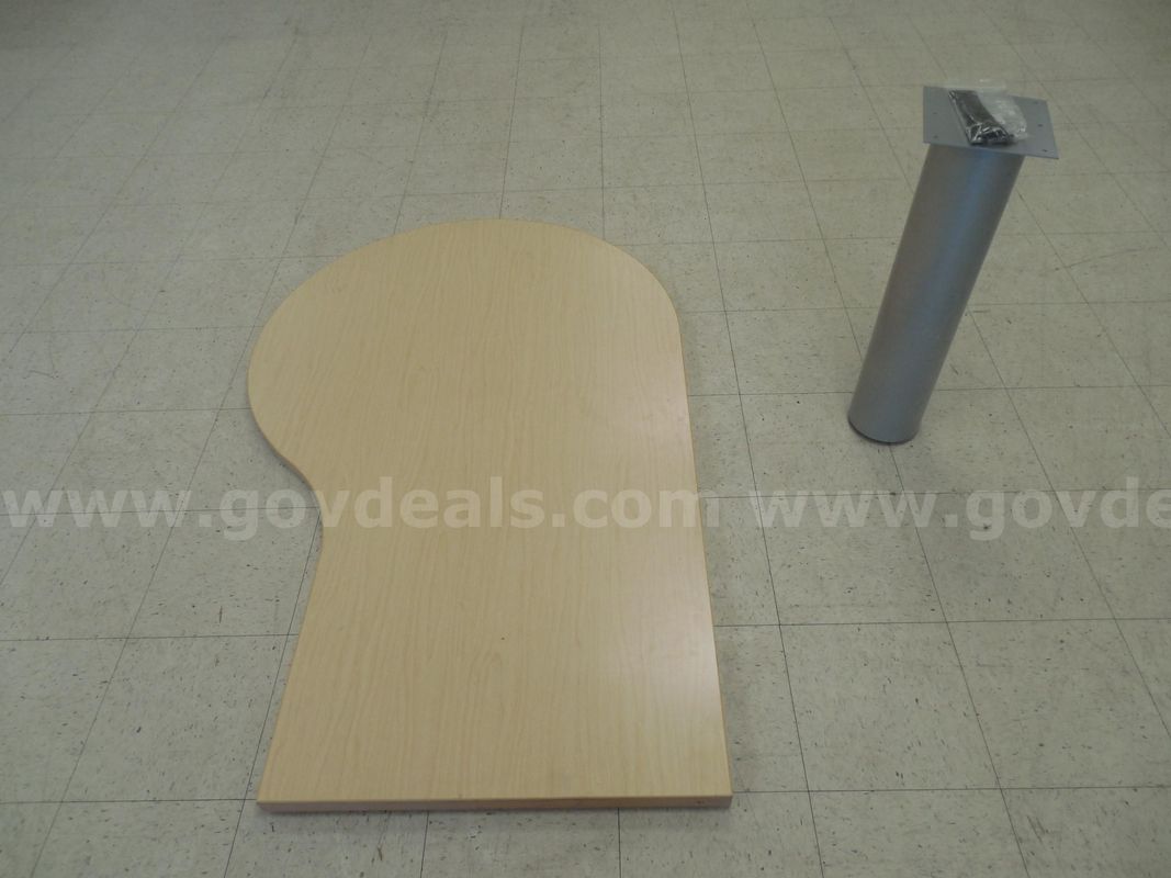 Teardrop shaped table top