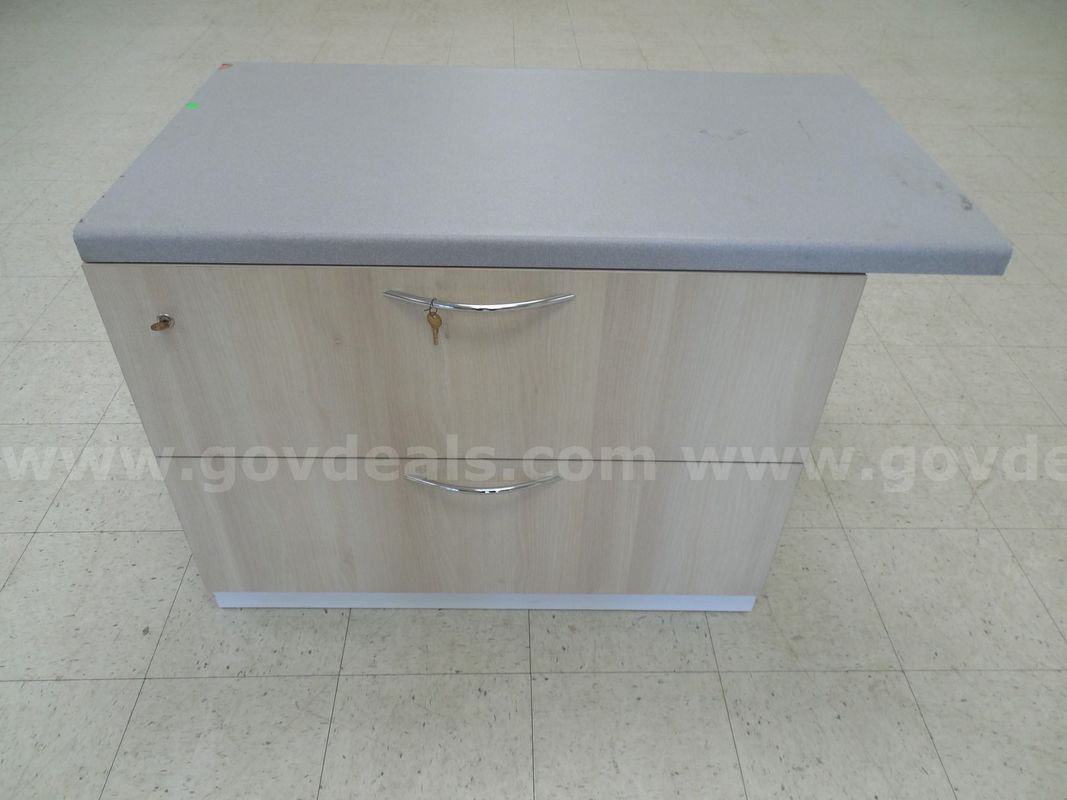 Two drawer lateral fling cabinet