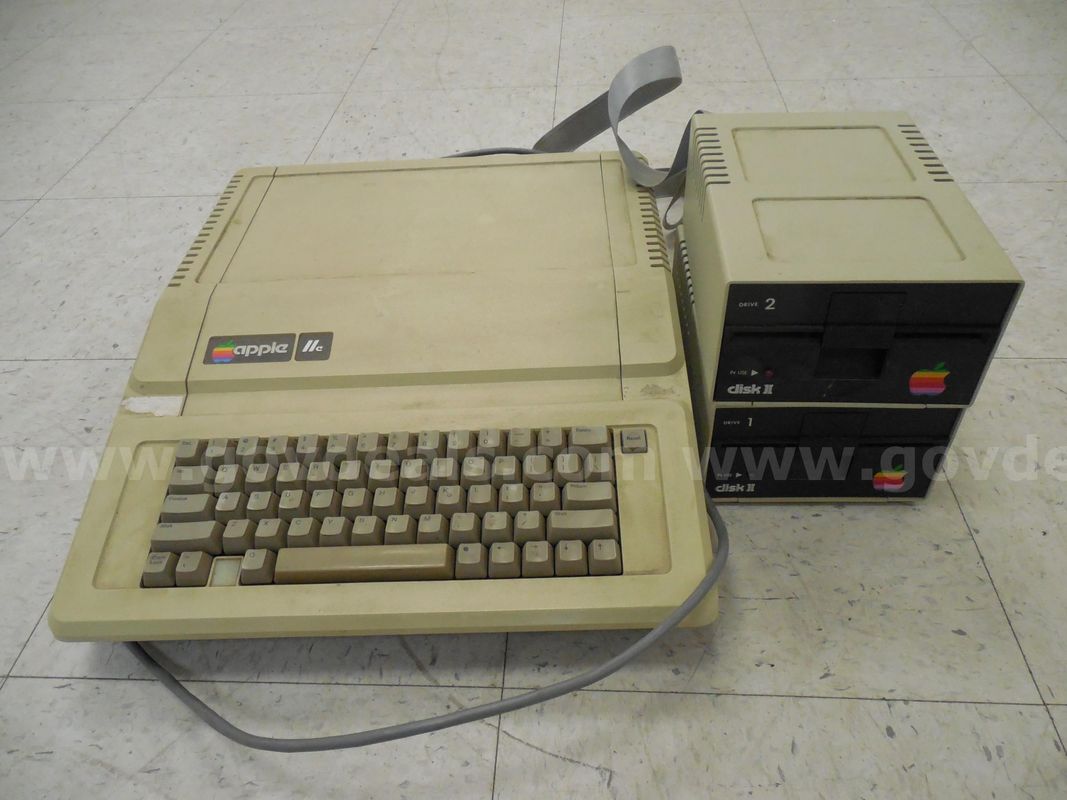 Apple lle with two attached floppy drives