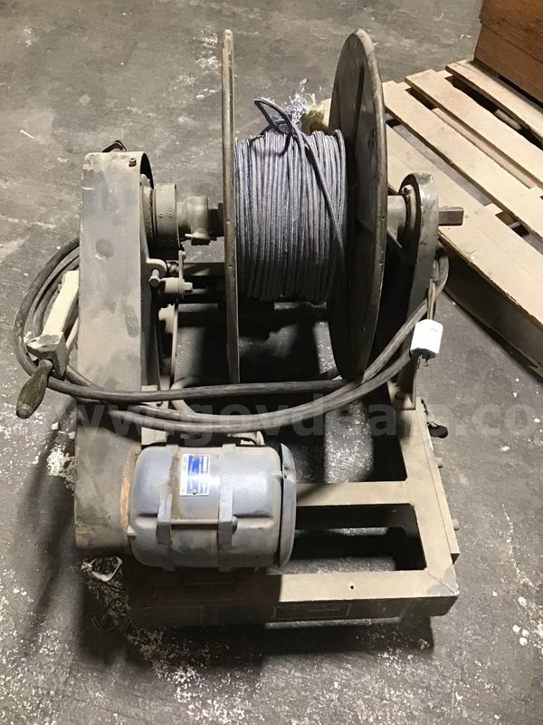 Motor driven cable reeling machine