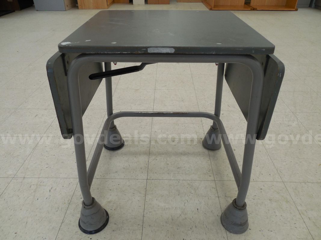 Vintage industrial drop leaf table on casters