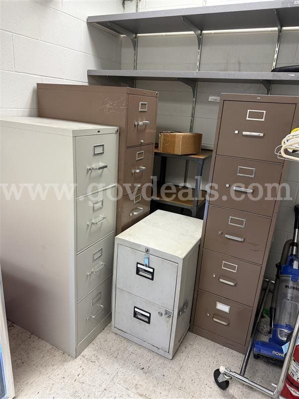 2 - 5 drawer file cabinets - one 4 drawer file cabinet and one file safe 2 drawer cabinet
