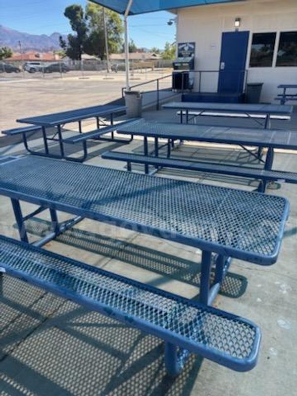 Nine (9) Mesh Metal Picnic Tables