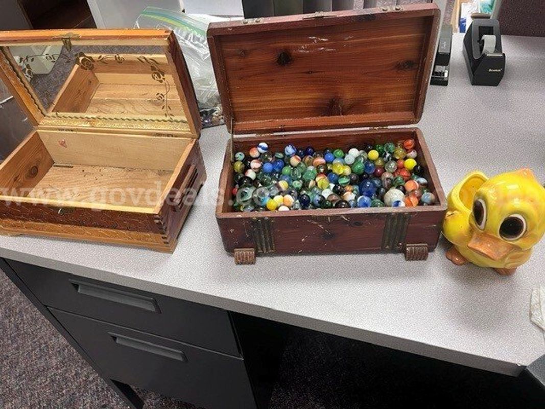 Lot of two jewelry boxes, marbles, and coin collecting duck